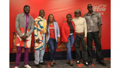 Polycarp, Chimano, Savara and Bien from Sauti Sol pose for a photo with Isabelle Rostom Kariuki and Miriam Limo,Head of Marketing,The Coca Cola Company,Kenya  at the Sol Fest partnership announcement. PHOTO/COURTESY